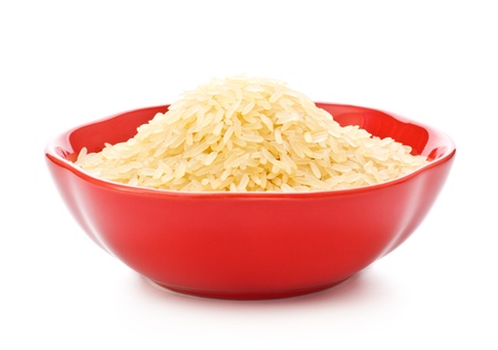 red bowl with rice isolated on whiteの写真素材