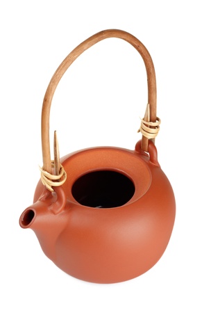 brown clay kettle isolated on white backgroundの写真素材
