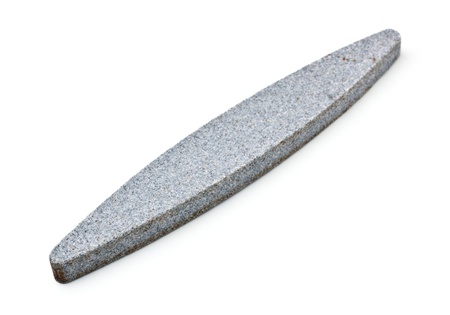 single gray whetstone isolated on white backgroundの写真素材