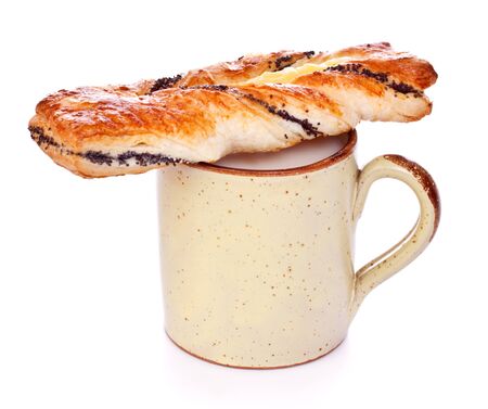 poppy pie and mug of milk isolated on whiteの写真素材