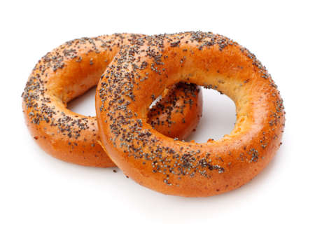 two bagels with poppy seeds isolated on white backgroundの写真素材