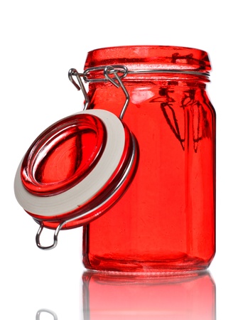 empty glass jar for spice isolated on whiteの写真素材