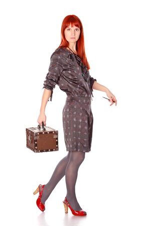 extravagant woman with suitcase isolated on whiteの写真素材