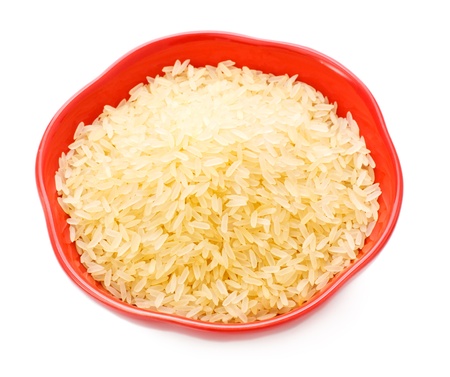 red bowl with rice isolated on whiteの写真素材