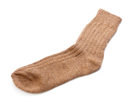 single woollen sock isolated on white backgroundの写真素材