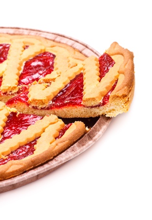 sliced pie with cherry jam isolated on whiteの写真素材