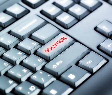 part of keyboard with special red button SOLUTIONの写真素材