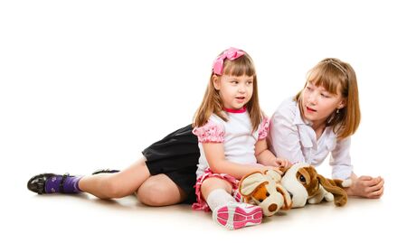 cute little sisters portrait, close up, isolated on whiteの写真素材
