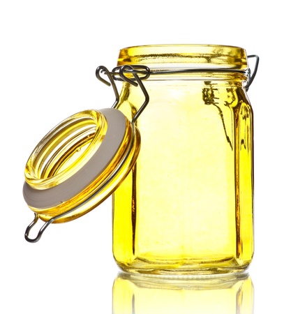 empty glass jar for spice isolated on whiteの写真素材