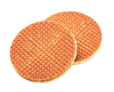 dutch waffles with caramel isolated on white backgroundの写真素材