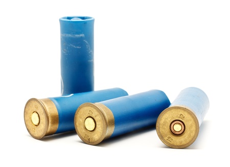 red shotgun cartridges isolated on white background
