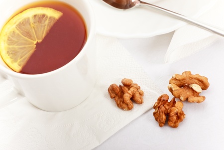 tea with lemon on white napkin, still lifeの写真素材