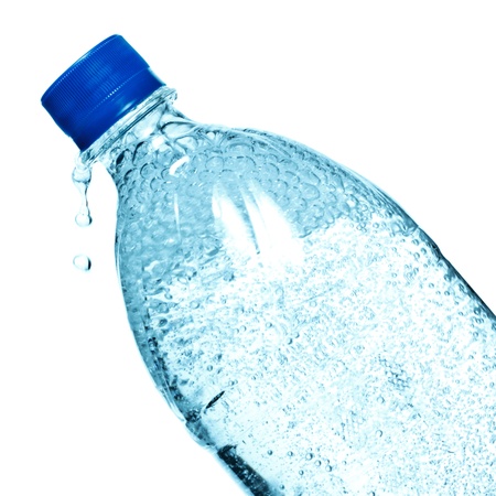 bottle of mineral water isolated on whiteの写真素材