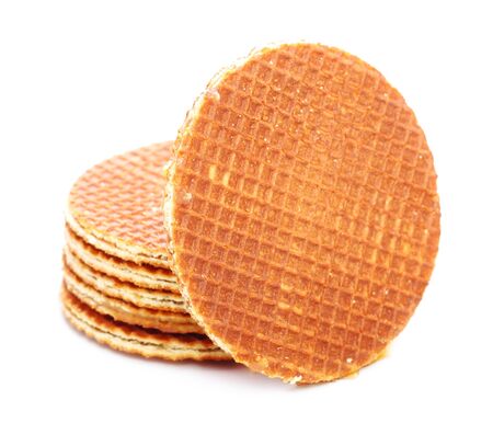 dutch waffles with caramel isolated on white backgroundの写真素材