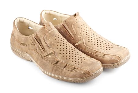 beige suede men shoes isolated on whiteの写真素材