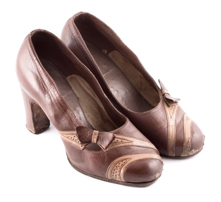 brown leather female shoes on grey backgroundの写真素材