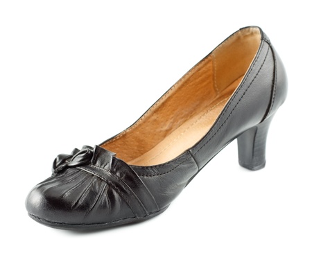 black leather female shoes on grey backgroundの写真素材