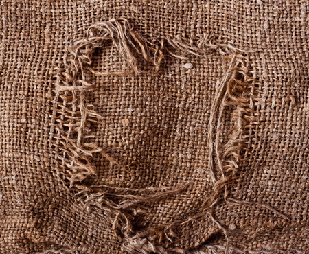 old torn sacking grunge texture as backgroundの写真素材