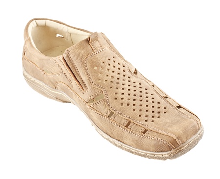 beige suede men shoe isolated on whiteの写真素材