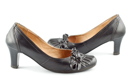 black leather female shoes on grey backgroundの写真素材