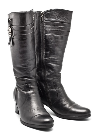 black leather female boots isolated on whiteの写真素材