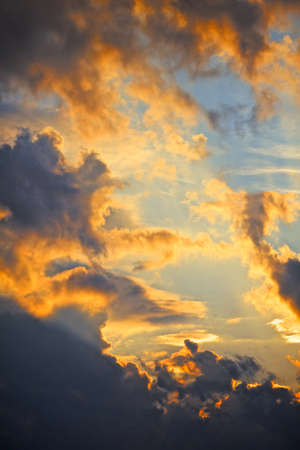 colorful dramatic sky with cloud at sunsetの写真素材