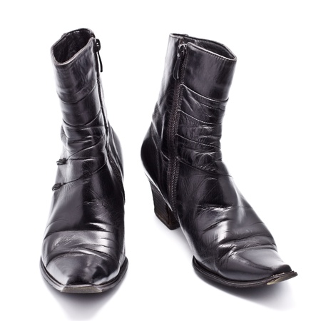 black leather female boots isolated on whiteの写真素材