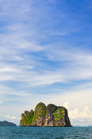 tall cliff with trees at Andaman Sea, Thailandの写真素材