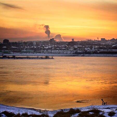 winter sunset over Angara at Irkutsk, Russiaの写真素材