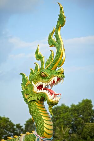 green water dragon statue in Krabi, Thailandの写真素材