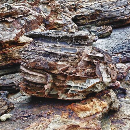 rocks and sand on shore, Thailand, close upの写真素材