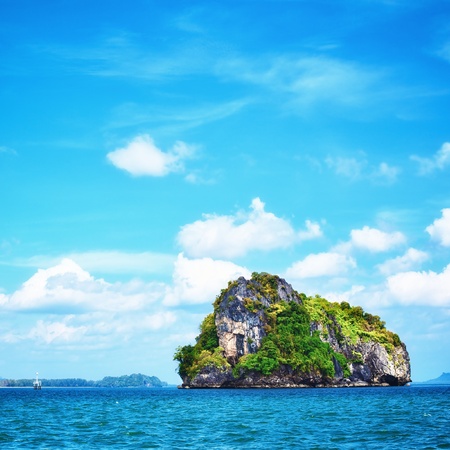 tall cliff with trees at Andaman Sea, Thailandの写真素材
