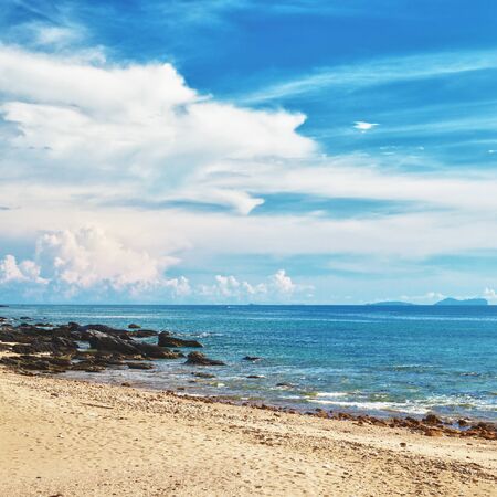 sunny beach with rocks, Andaman Sea, Thailandの写真素材