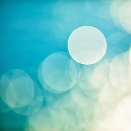 bright colorful sun and sea bokeh background