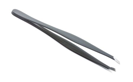 metal eyebrow tweezers isolated on white backgroundの写真素材