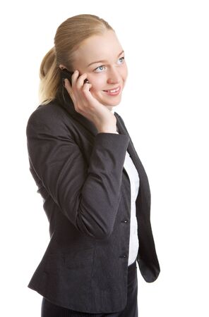happy business woman talking on cell phone, isolated on whiteの写真素材