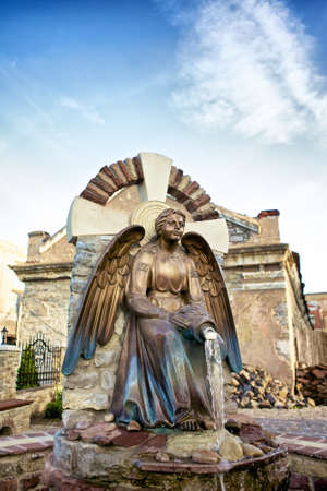 statue with jar in Kamenetz-Podolsk , Ukraineの写真素材
