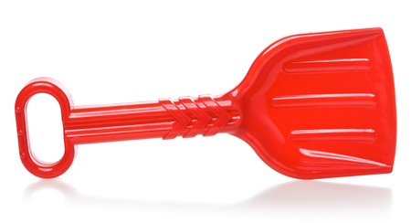 red toy scoop, isolated on white backgroundの写真素材