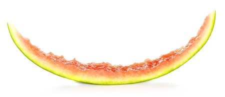 eaten slice of watermelon isolated on whiteの写真素材