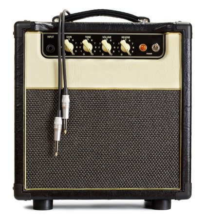 black vintage guitar aplifier with cable, isolated on whiteの写真素材