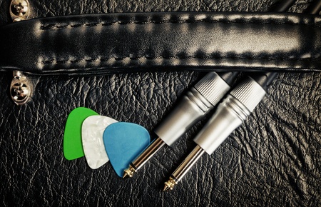 guitar amplifier with cable jack and plectrums, closeupの写真素材