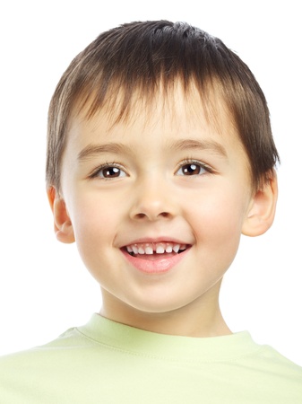 beautiful smiling boy portrait, isolated on whiteの写真素材