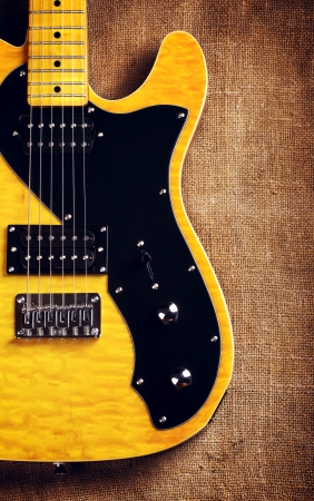 yellow semi-hollow electric guitarの写真素材