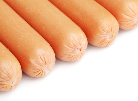 fresh sausages, isolated on a whiteの写真素材