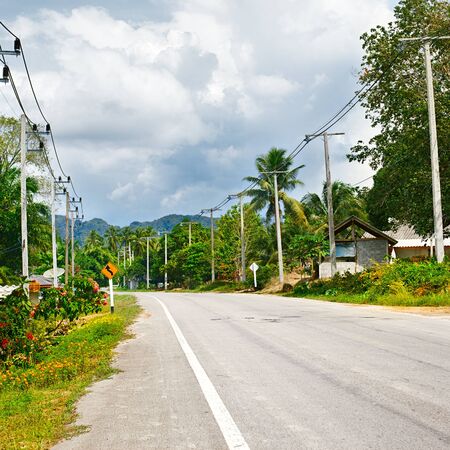 asphalt highway in jungle wit mount, Krabi, Thailandの写真素材