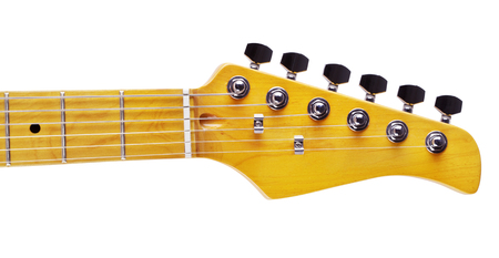 yellow electric guitar fretboard, isolated on whiteの写真素材