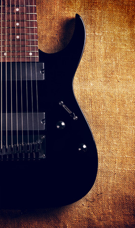black electric eight-string guitar, on canvas backgroundの写真素材