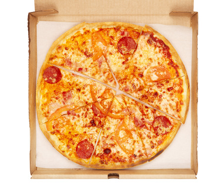 fresh pizza in box, isolated on whiteの写真素材