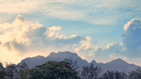 thai mountains under cloudy sky, early morningの写真素材