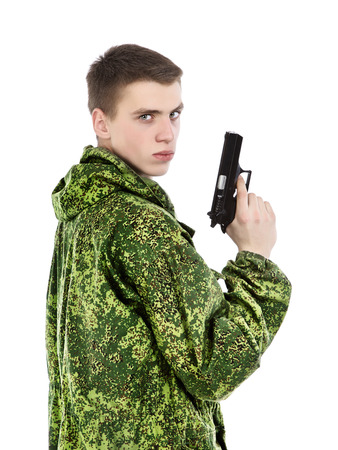 young military man with gun, isolated on whiteの写真素材